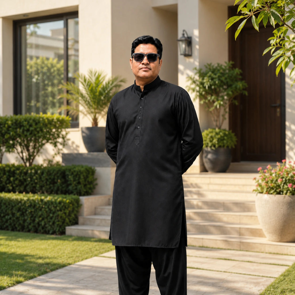 Elegant Portrait in Black Traditional Attire with Modern Home Background